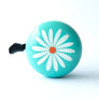 Mint coloured bicycle bell with a white flower design on a mint bike bell. Cute bike bell