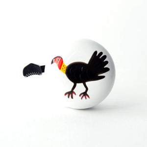A fun Australian bush turkey design on a white bike bell