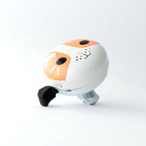 A cute kitty bike bell with a cat face design  on a white bike bell