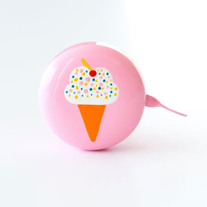 Pink bike bell with ice cream design on the top