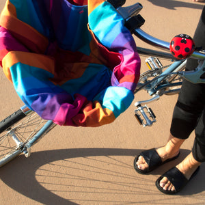 Beep Ladybug bell mounted on silver kids bike handlebar — cute red ladybug scooter bell in use