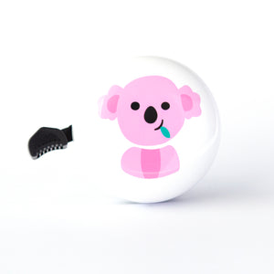 A white Bike bell with a cute pink Australian Koala on top of it