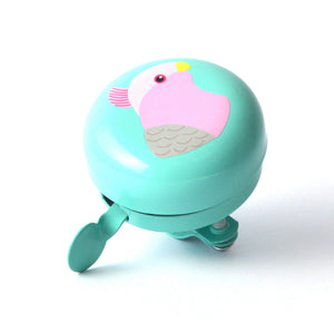 A mint green bicycle bell featuring a cute pink and white bird illustration on the front, set against a plain white background.
