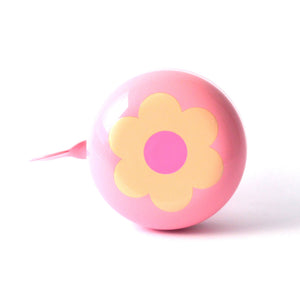Beep Retro Flower Bicycle Bell a beige flower on a pink bell