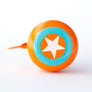 Vibrant orange bike bell with Star Super Hero design in white and turquoise.  A cool bicycle bell