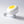 WHITE BIKE BELL WITH YELLOW SUNSHINE FACE ON TOP