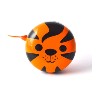 Cute tiger face on an orange bike bell.