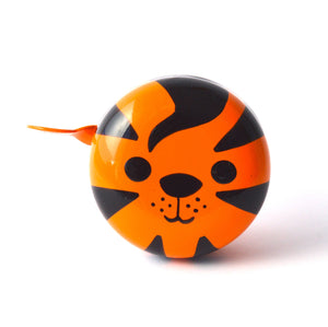 Cute tiger face on an orange bike bell.
