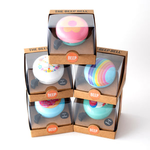 Colourful Bike Bells in cool stackable recycled packaging.